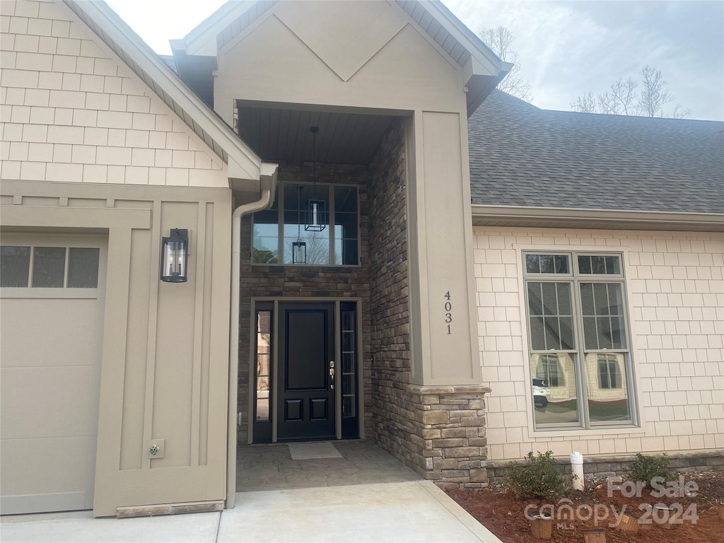 property entrance featuring a garage