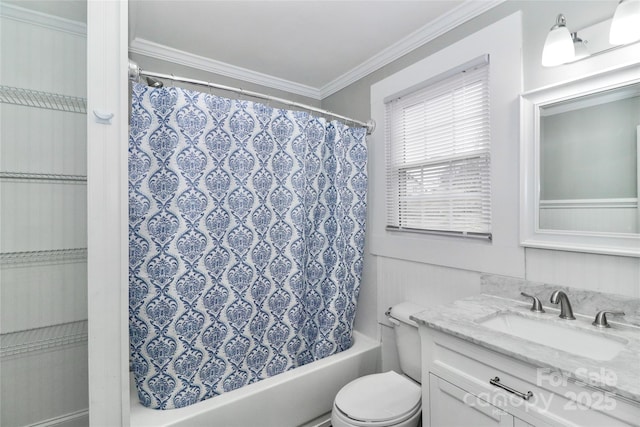 bathroom featuring ornamental molding, vanity, and toilet