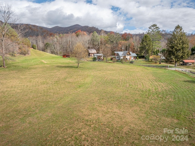 property view of mountains featuring a rural view