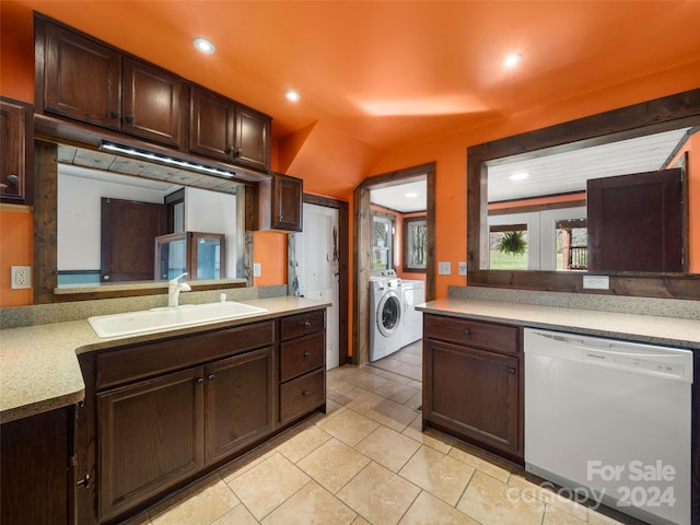 kitchen featuring dishwasher, french doors, sink, separate washer and dryer, and dark brown cabinets