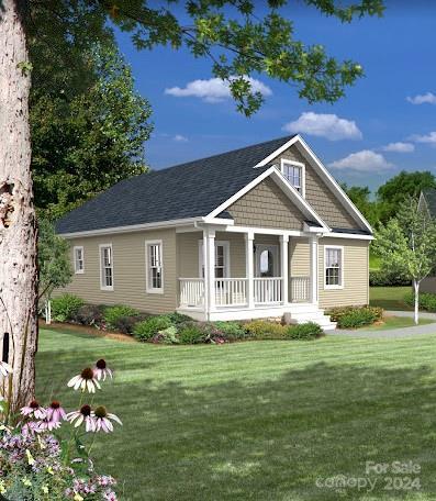 view of front of property featuring covered porch and a front lawn