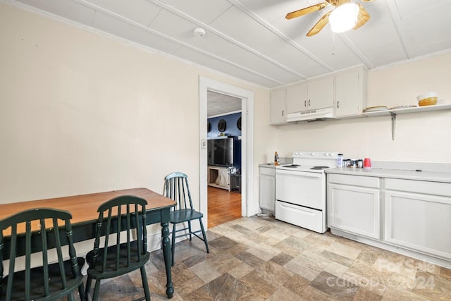 kitchen with white electric range oven, white cabinetry, ceiling fan, and crown molding