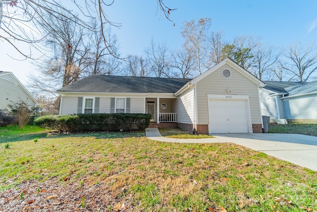 ranch-style home with a garage and a front yard