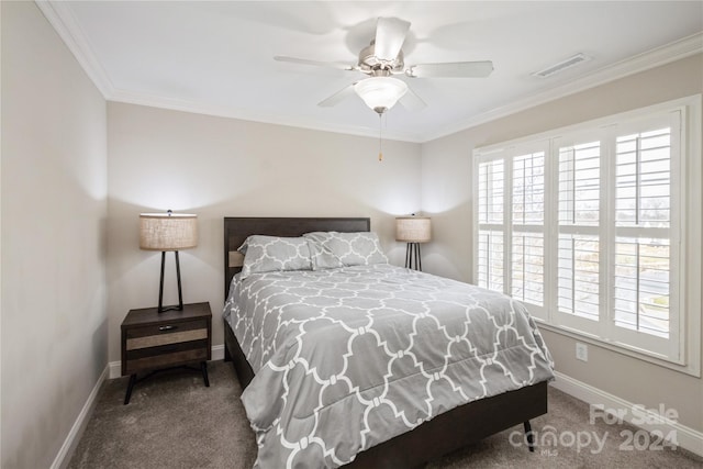 bedroom featuring multiple windows, ceiling fan, and carpet