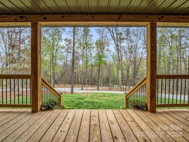 deck featuring a yard