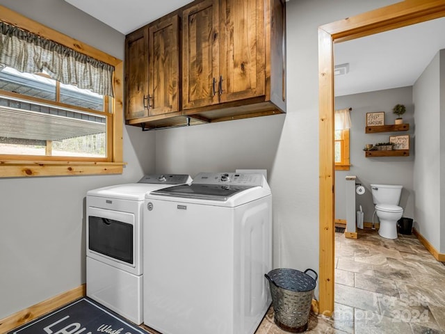 laundry room with washer and dryer