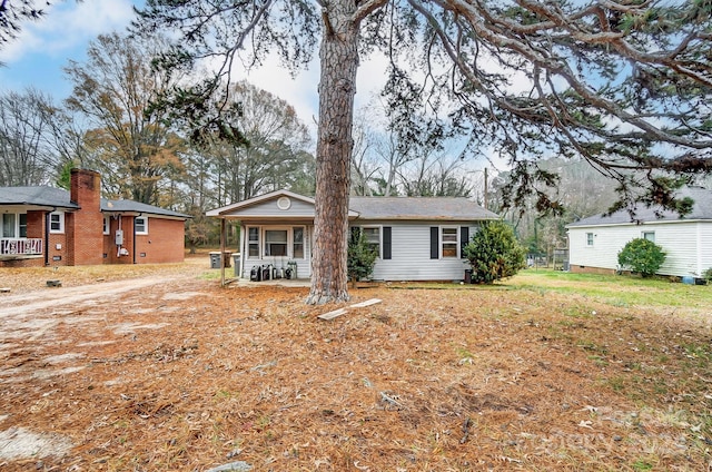 ranch-style house with covered porch