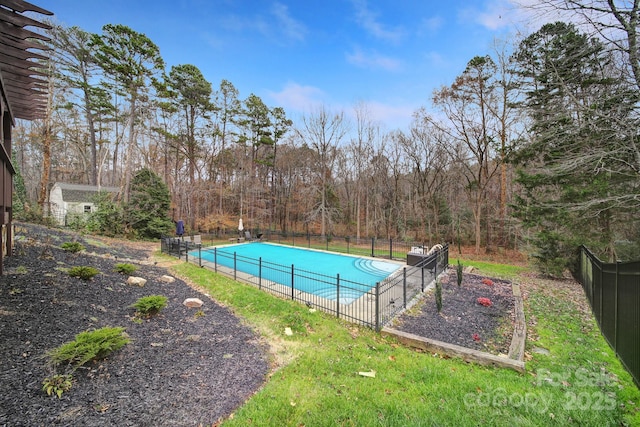 view of swimming pool with an outdoor structure