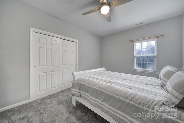 bedroom featuring carpet, ceiling fan, and a closet