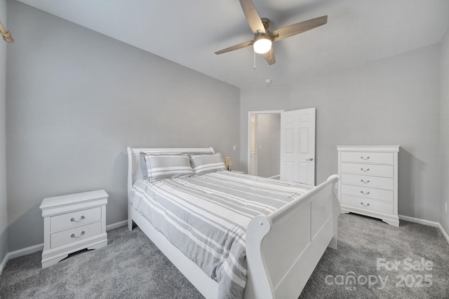 bedroom with ceiling fan and dark carpet