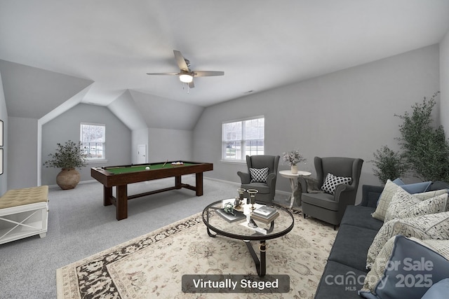 game room featuring lofted ceiling, a healthy amount of sunlight, light colored carpet, and billiards