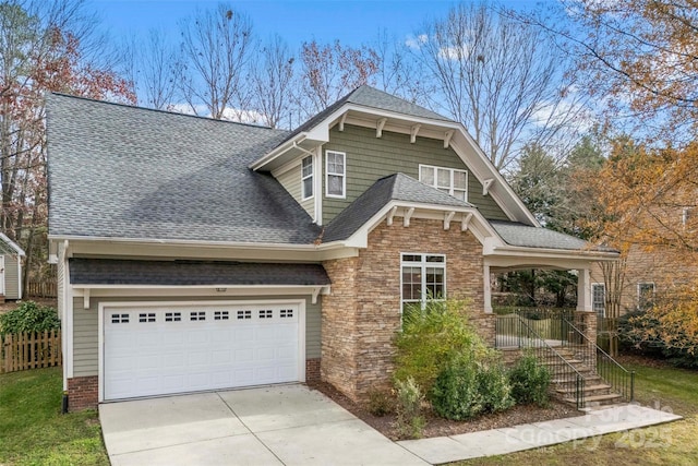 craftsman-style home with a garage and a porch