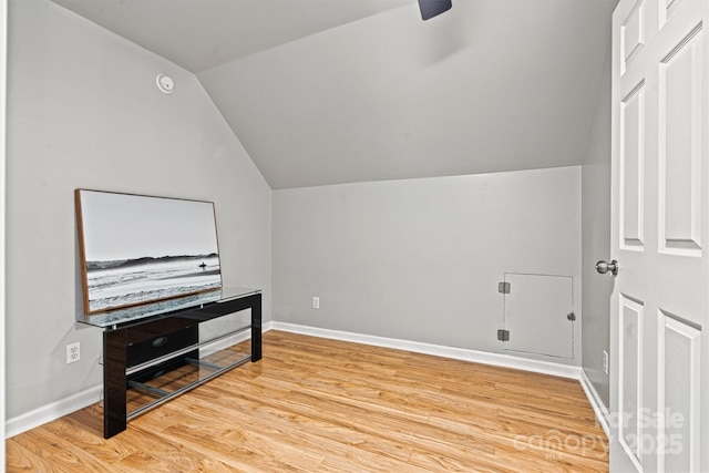 bonus room with ceiling fan, vaulted ceiling, and wood-type flooring