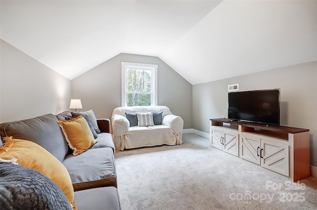 carpeted living room with lofted ceiling