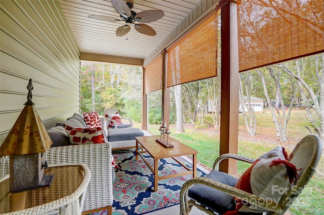 sunroom / solarium with ceiling fan