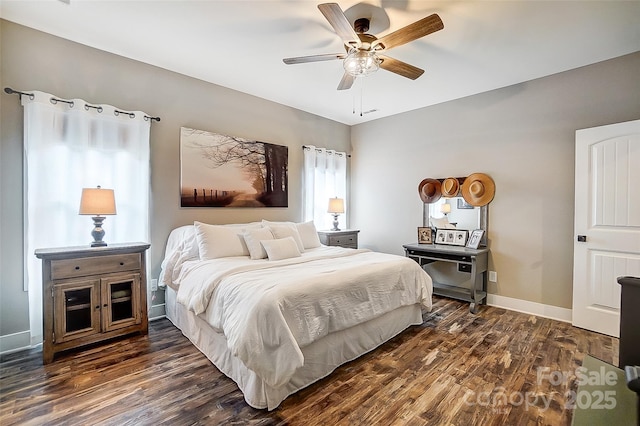 bedroom featuring ceiling fan and dark wood-type flooring