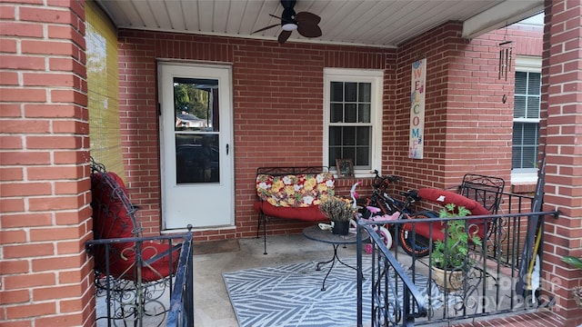 view of patio / terrace featuring ceiling fan