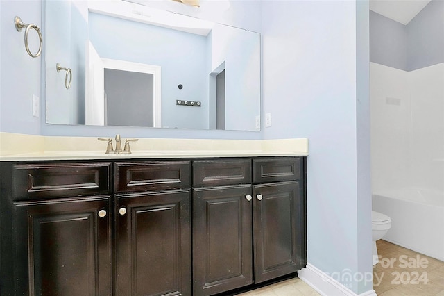 full bathroom featuring tile patterned floors, vanity, bathtub / shower combination, and toilet