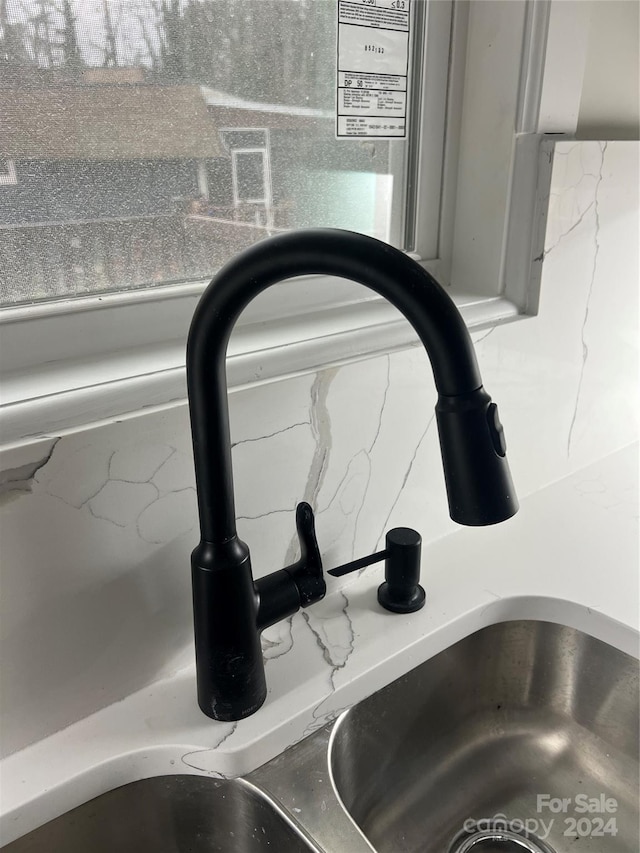 details with tasteful backsplash and sink