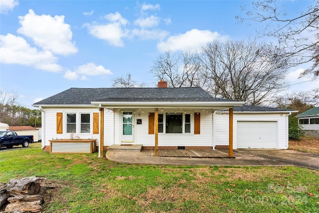 single story home featuring covered porch, a front yard, and a garage