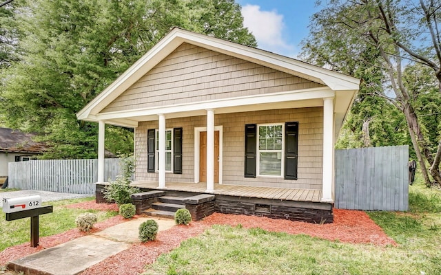 bungalow featuring covered porch