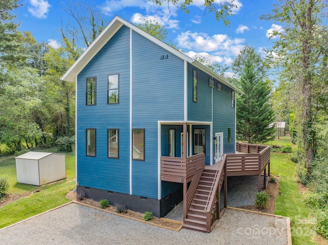 view of home's exterior featuring a wooden deck