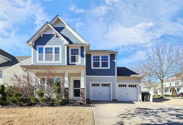 view of front of property with a garage