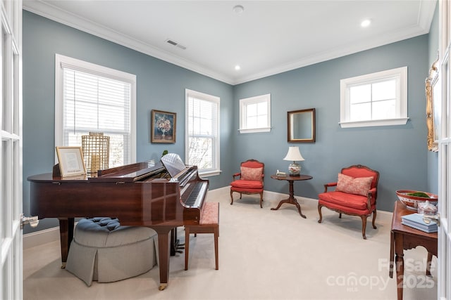 sitting room featuring carpet flooring, baseboards, visible vents, recessed lighting, and crown molding