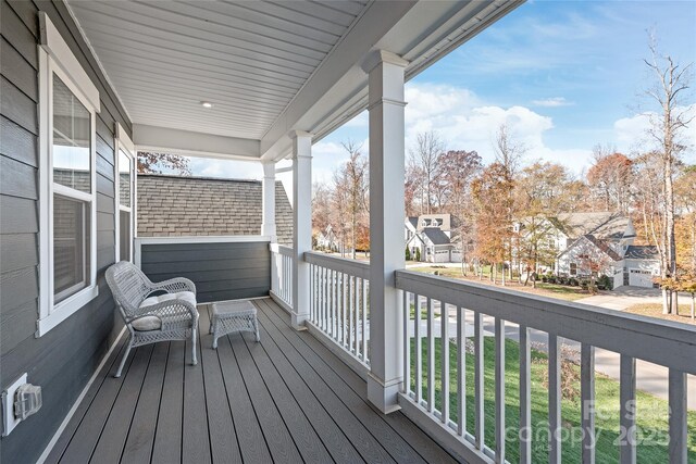 wooden terrace with covered porch