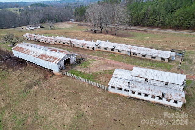 birds eye view of property featuring a rural view