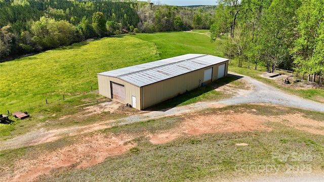 drone / aerial view with a forest view