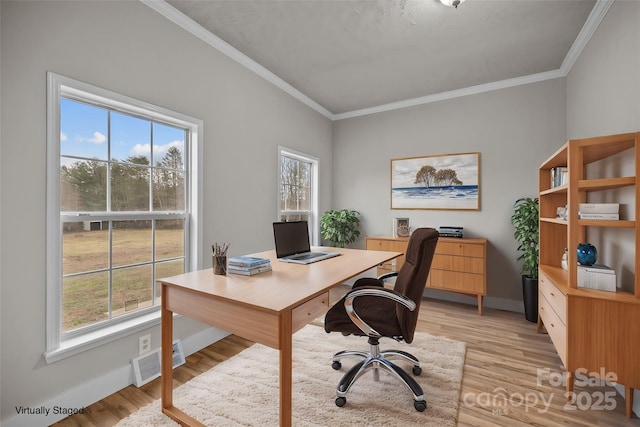 office area featuring crown molding and light wood-type flooring