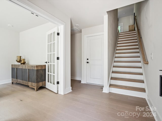 7022 Impulse Ct, Charlotte, NC 28205 - stairs with wood finished floors and baseboards
