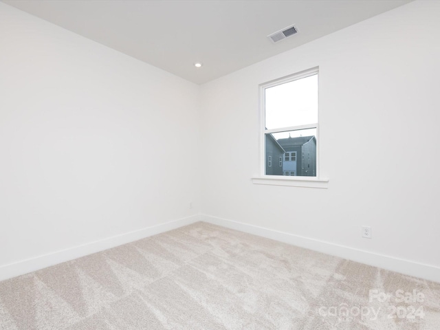 7022 Impulse Ct, Charlotte, NC 28205 - empty room with carpet floors and recessed lighting