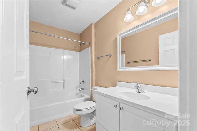 full bathroom with tile patterned flooring, vanity, washtub / shower combination, and toilet