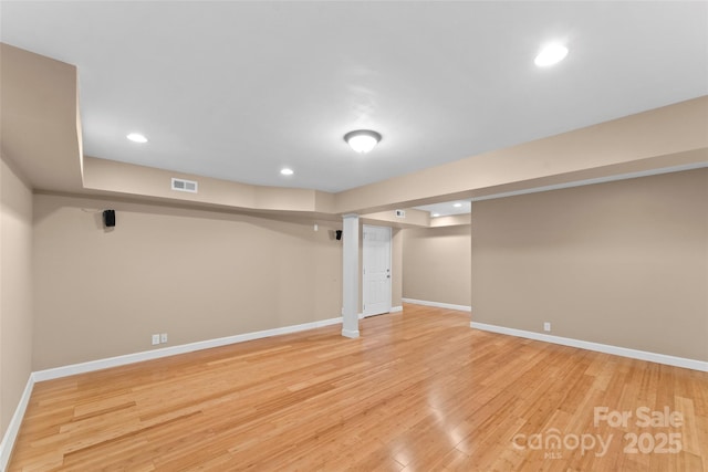 basement with light wood-type flooring