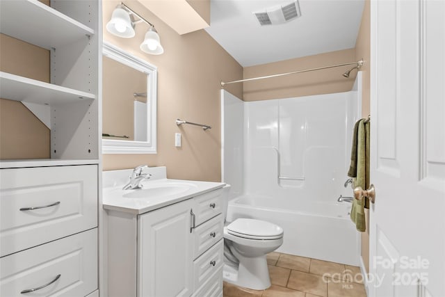 full bathroom with tile patterned flooring, vanity, shower / bathtub combination, and toilet