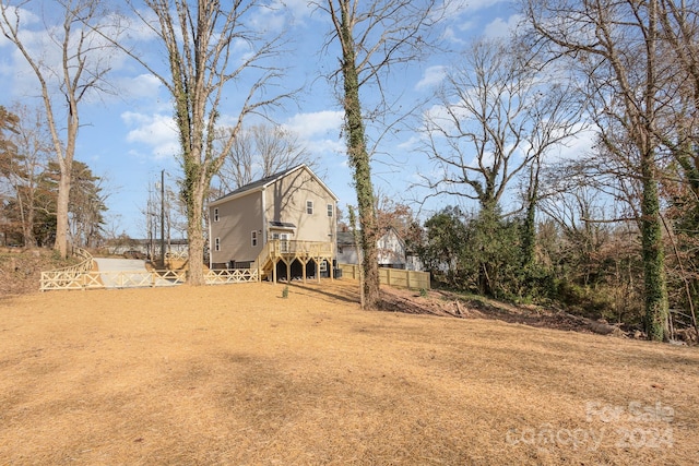 view of yard with a deck