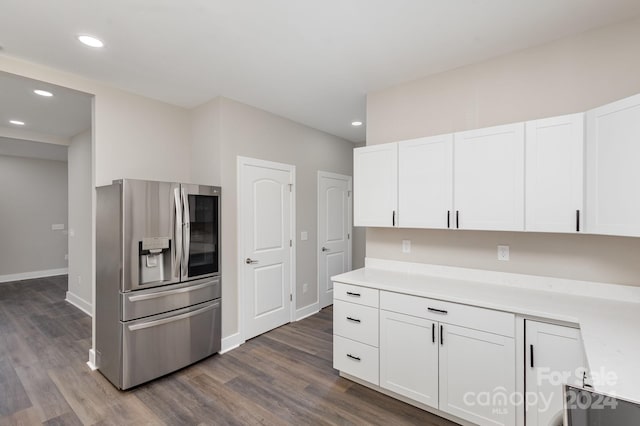 kitchen with white cabinetry, dark hardwood / wood-style flooring, and stainless steel refrigerator with ice dispenser