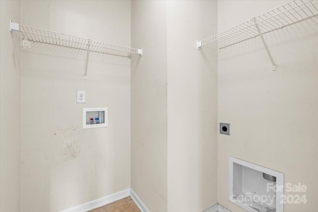 laundry area featuring hookup for an electric dryer and hookup for a washing machine