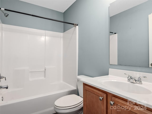 full bathroom with vanity, shower / bath combination, and toilet