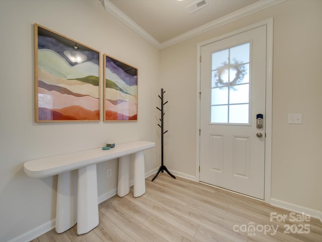 doorway featuring light hardwood / wood-style floors and ornamental molding