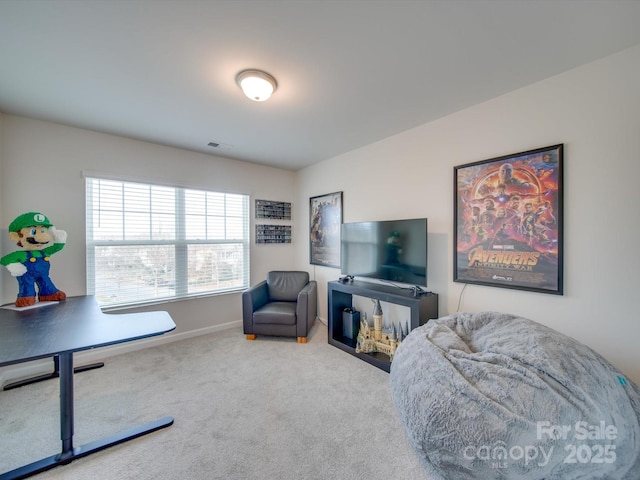 living area with carpet flooring