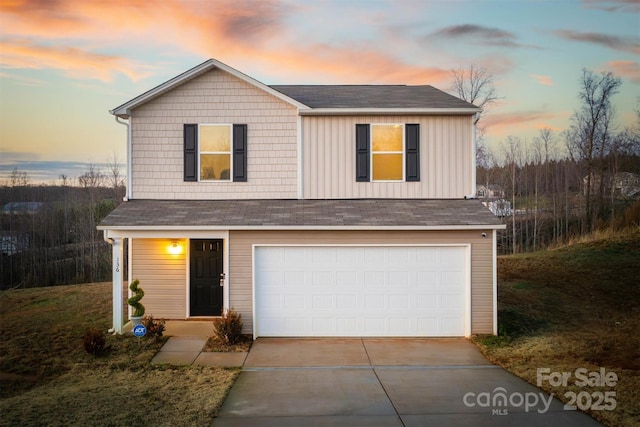 view of property with a garage