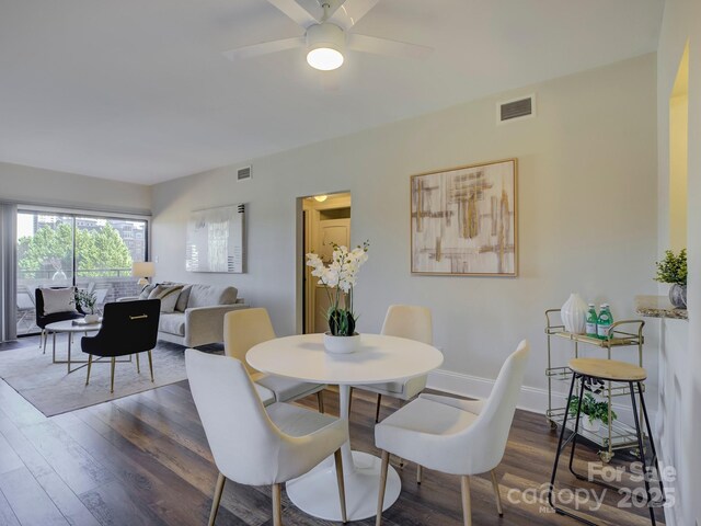 224 N Poplar St Unit 19, Charlotte, NC 28202 - dining room featuring wood finished floors and ceiling fan