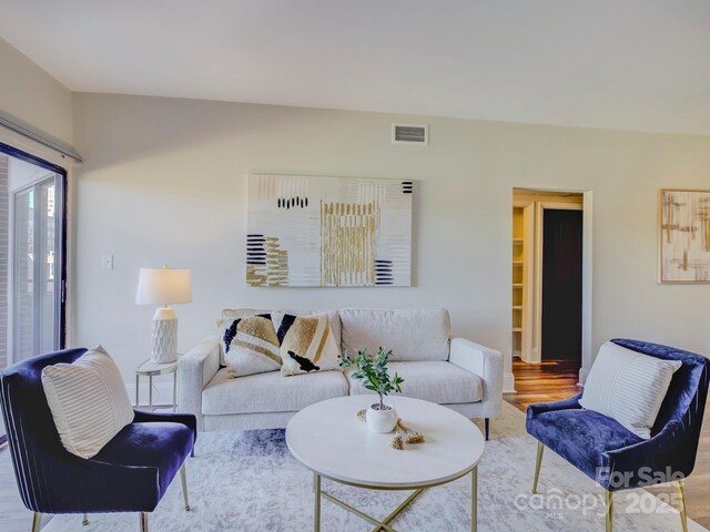 224 N Poplar St Unit 19, Charlotte, NC 28202 - living room featuring wood finished floors