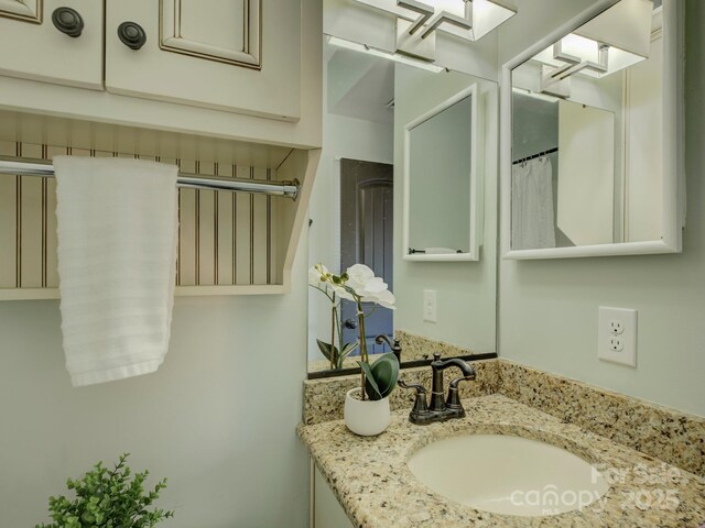 224 N Poplar St Unit 19, Charlotte, NC 28202 - bathroom featuring vanity