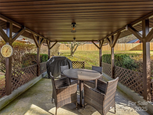 view of patio featuring a grill