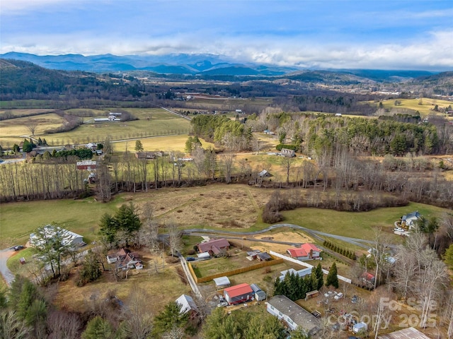 aerial view featuring a mountain view and a rural view