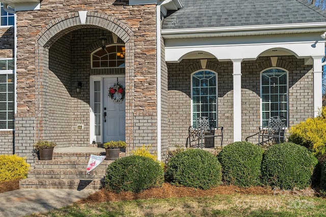 property entrance featuring covered porch